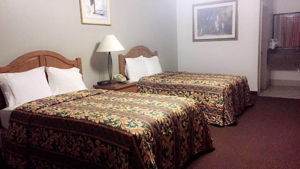 Garden Inn&Suites Silsbee Buitenkant foto